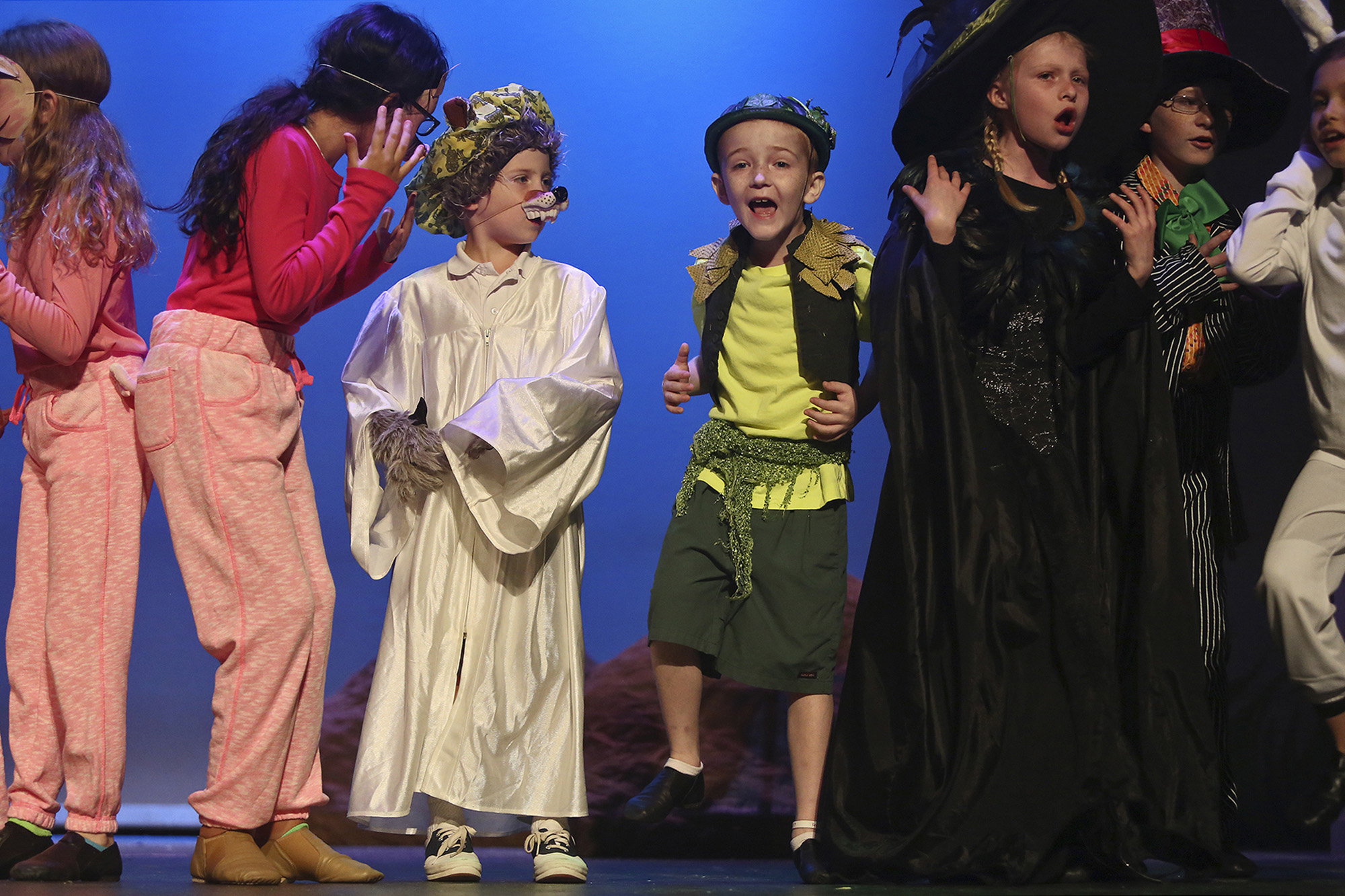 Rowan Windham, 8, sings and dances during a rehearsal for Shrek II at Woodlawn Theatre in San Antonio May 2015. One of his main passions was acting even through he often had to endure nine-hour iron infusions at a clinic before going to the theater. Woodlawn Theatre awards a scholarship in his name every year.